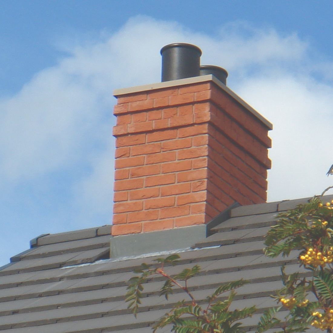 Rebuilt brick chimney stack